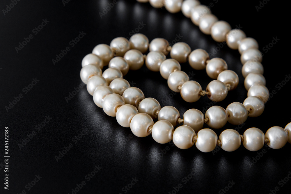 Pearls on black background Pearls on black background
