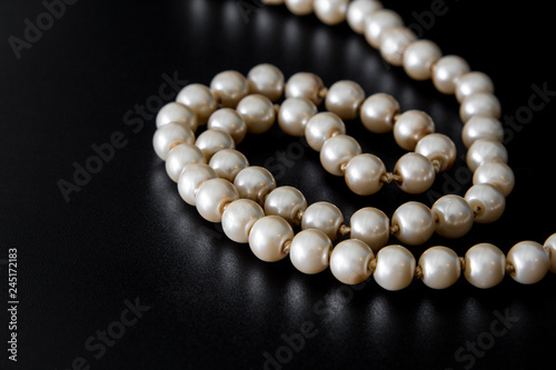 Pearls on black background