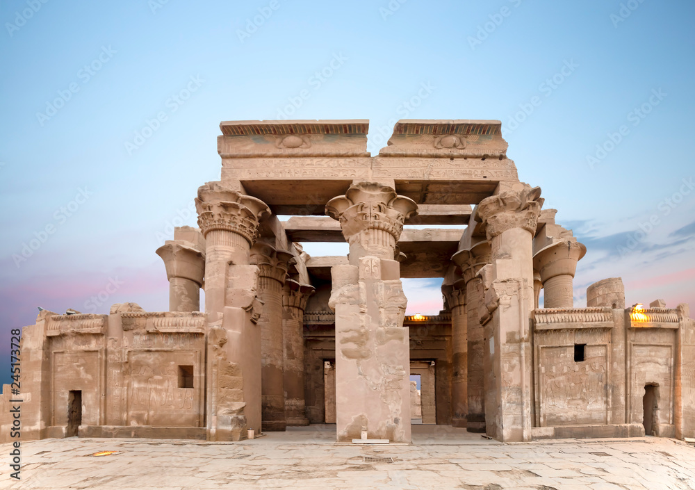 Ruins of the Temple of Kom Ombo in the Nile river at sunset, Egypt