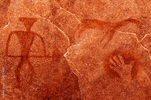 the image of an ancient man on the wall of the cave. history, antiquities, archaeology, era.