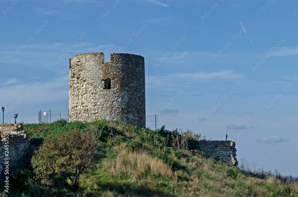 Ruined watch tower and stone with brick walls around Western fortification in ancient city Nessebar or Mesembria on the Black Sea coast, Bulgaria, Europe 