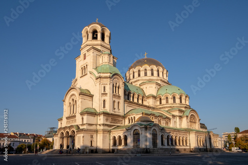 Side view of Alexander Nevsky Orthodox Cathedral of Sofia, Bulgaria under a blue sunny sky