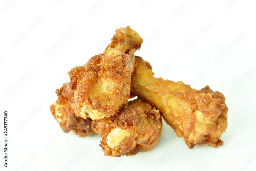 crispy fried chicken leg on white background crispy fried chicken leg on white background