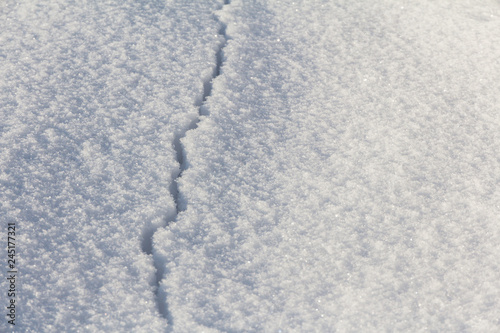  crack in clear deep snow