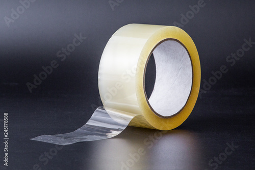 adhesive tape on black background