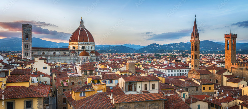 Panoramic view of Florence sunset city skyline with Cathedral and bell tower Duomo and Palazzo del Bargello. Florence, Italy.