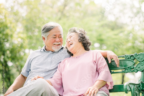 Happy Asian Senior couple laughing