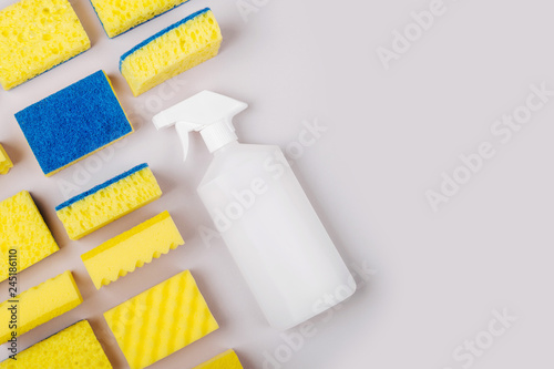 Sponges on gray background. Cleaning or housekeeping concept background. Copy space. Flat lay  Top view.