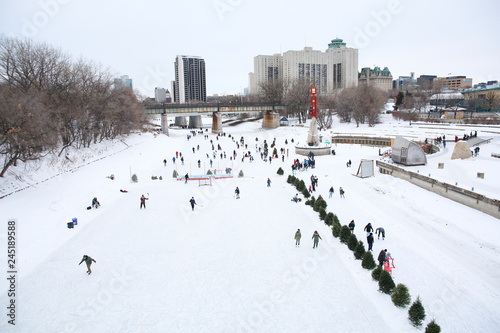 Winnipeg, Manitoba / Canada - January 5, 2019: Winter activities in a beautiful landscape covered by snow. photo