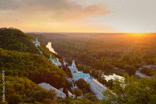 Sunset landscape. Holy Mountains and Sviatogorskaya Lavra at Sviatogorsk and Seversky Donets river. photo