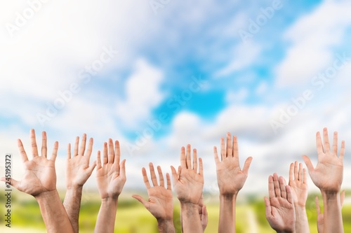 Group of people hands showing thumbs up signs on background