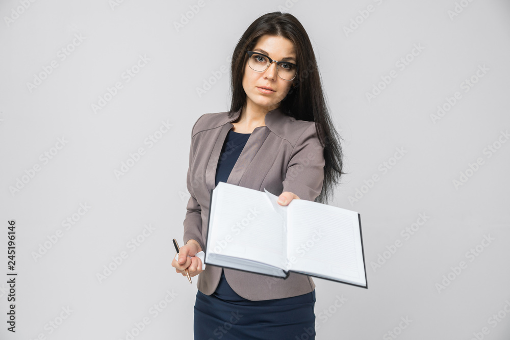 young girl stretches out ahead the day planner isolated on light background young girl stretches out ahead the day planner isolated on light background
