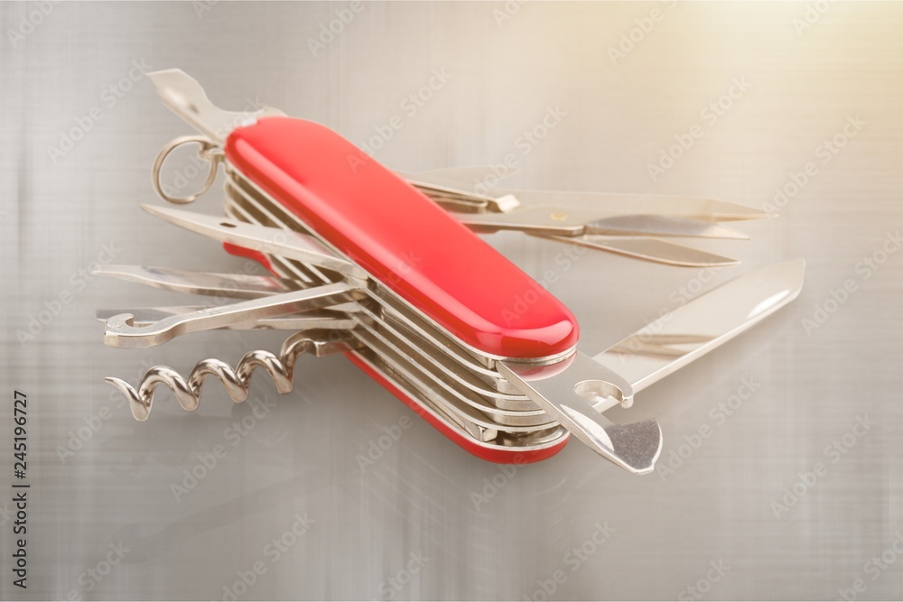 Multi-Tasking metal Penknife isolated on white Multi-Tasking metal Penknife isolated on white