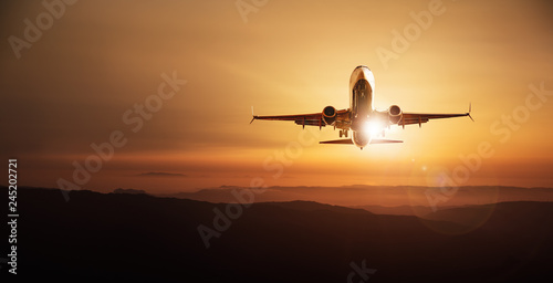modern aircraft against a sunset