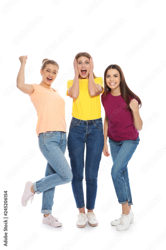 Obraz premium Young women celebrating victory on white background