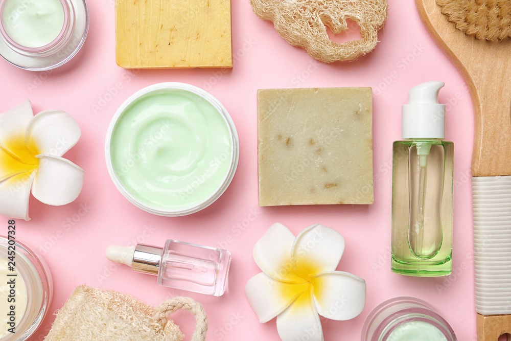 Flat lay composition with body care products on color background Flat lay composition with body care products on color background