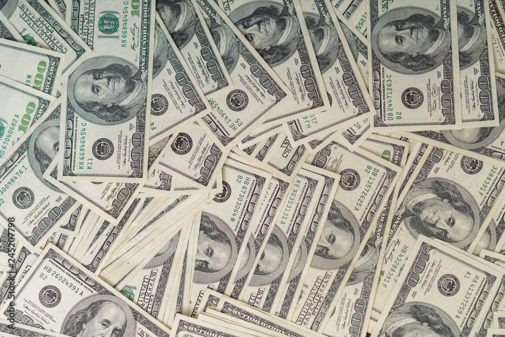 Full frame background of 100 USD banknotes Full frame background of 100 USD banknotes