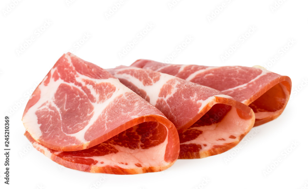 Meat slicing close-up on a white. Isolated. Meat slicing close-up on a white. Isolated.