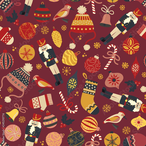 Vintage Christmas seamless vector pattern background. Nutcracker, hat, mitten, stocking, candy cane, bird, ornaments. Repeating retro Christmas design for fabric, gift wrap, greeting card, web banner