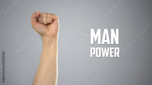 Sign man power with male hand, sports nutrition, endurance and men's health