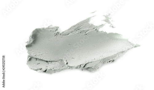 Face clay smear of cosmetic cream isolated on white background and texture