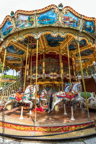 vintage carousel with horses © dieterjaeschkephotos