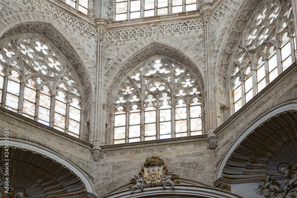 Fototapeta premium Valencia Cathedral interior. The church has different architectural styles - roman, gothic and baroque - which make in the main historical landmark of the city