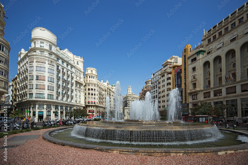 Valencia city street view at the square of Ajuntament (City Hall) in sunny day. It is the central square of Valencia