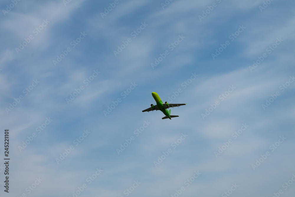 Place flying in sunset sky. Passenger plane on a background of the sky Place flying in sunset sky. Passenger plane on a background of the sky