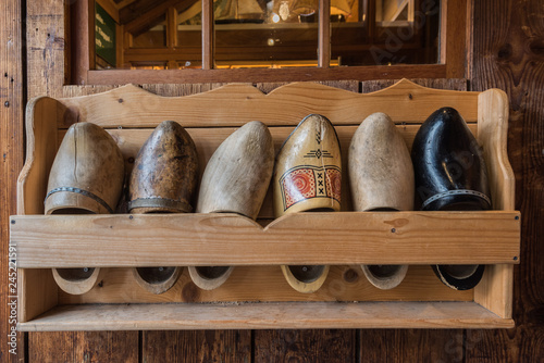 Close up of shoes arranged in shoe rack