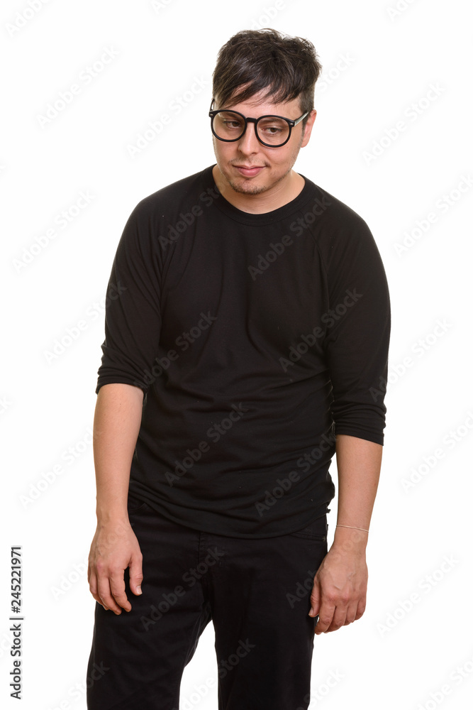 Studio shot of Caucasian man looking tired Studio shot of Caucasian man looking tired
