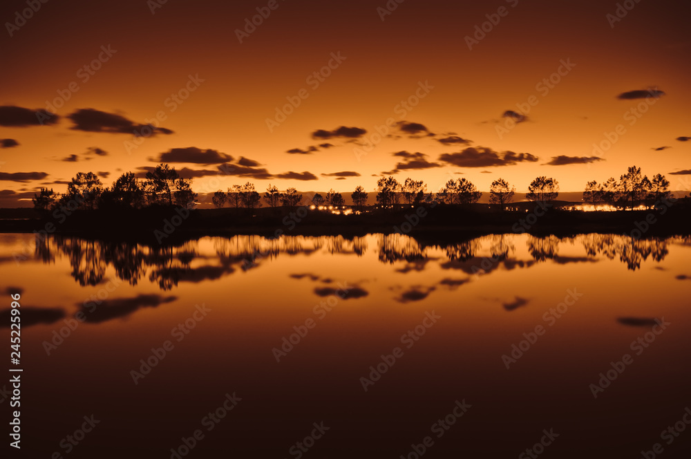 Scenic view of Moutchic beach and Lacanau lake during sunset Scenic view of Moutchic beach and Lacanau lake during sunset