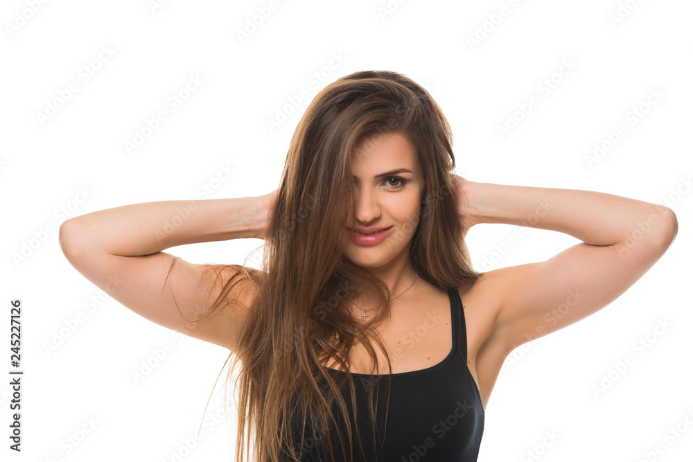 Young beautiful woman coquettishly looks on isolated white background Young beautiful woman coquettishly looks on isolated white background