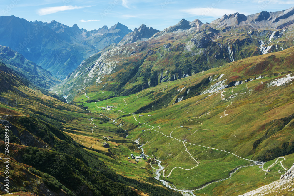 Mountain landscape in the French Alps with beautiful views of the valleys and peaks.