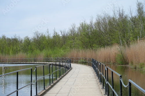 wooden bridge over lake © Clip Arts Fusion 