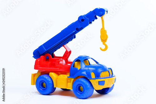 Toy plastic car on a white background