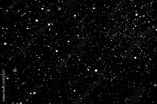 falling snow on a black background  snowfall at night  white spots on a black background