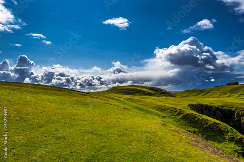 Spectacular Cloud Formation Over The Green Cliffs At Clachtoll Beach Near Lochinver In Scotland photo