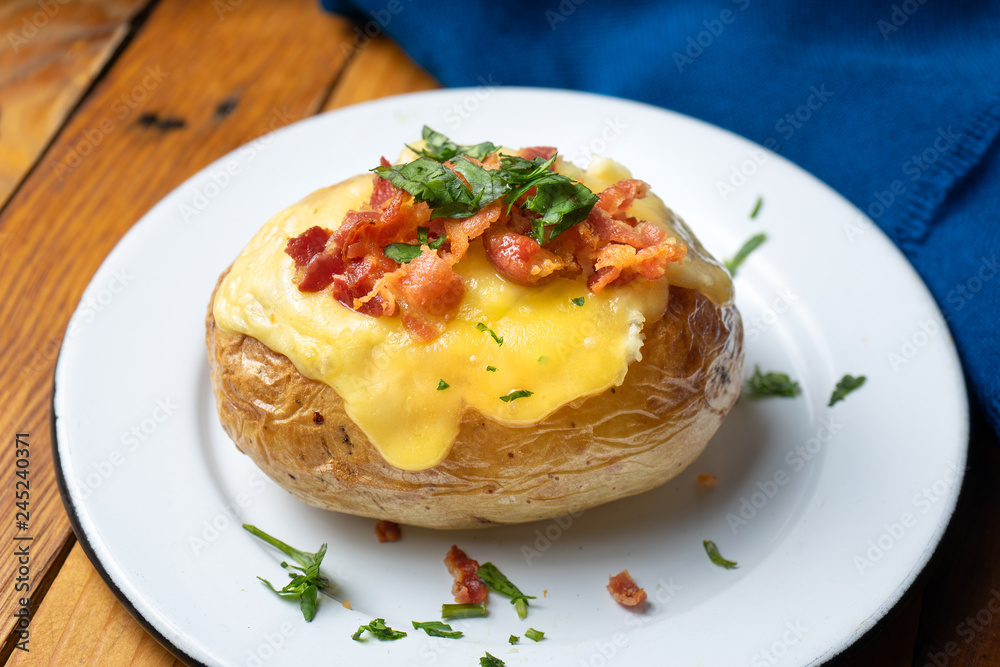 Baked potato with bacon and cheese