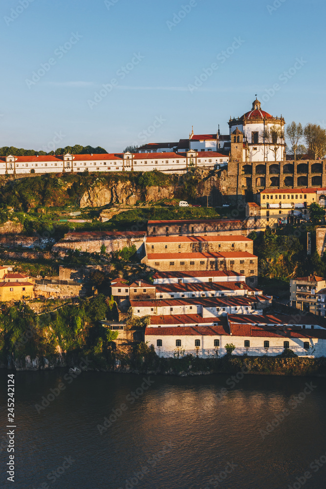 View of Porto across the Duoro river at sunset