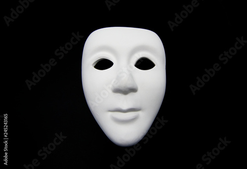 White mask on a black background 