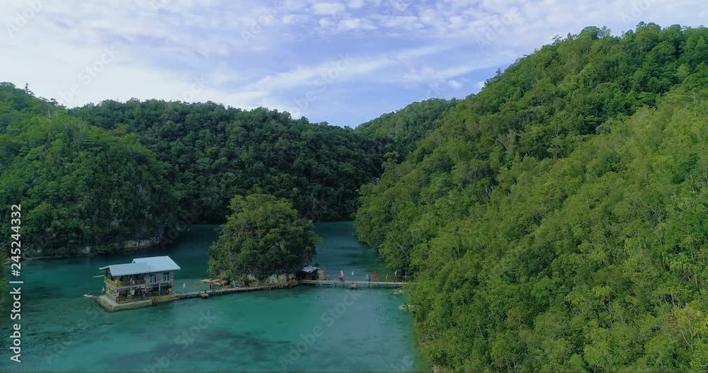 Aerial view flying over the beautiful and tropical green mountains Sugba Lagoon in Siargao, Philippines Aerial view flying over the beautiful and tropical green mountains Sugba Lagoon in Siargao, Philippines