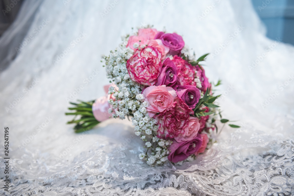 Brides bouquet with roses and pearl decoration Brides bouquet with roses and pearl decoration