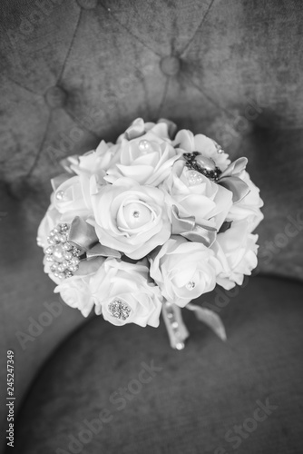 white roses bouquet displayed before the wedding