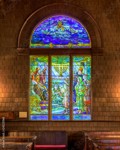 Stained glass window in the rear of the historic Faith Chapel on Jekyll Island, Georgia