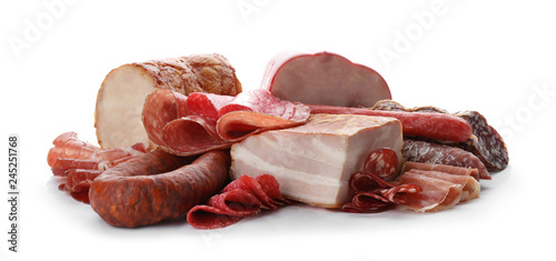 Different tasty meat delicacies on white background