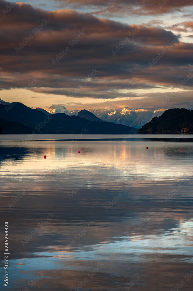Harrison Lake is the largest lake in the southern Coast Mountains of Canada. The view from the lakefront is dominated by Breckenridge Glacier in the distance and by Echo Island. Lake Harrison, British Harrison Lake is the largest lake in the southern Coast Mountains of Canada. The view from the lakefront is dominated by Breckenridge Glacier in the distance and by Echo Island. Lake Harrison, British