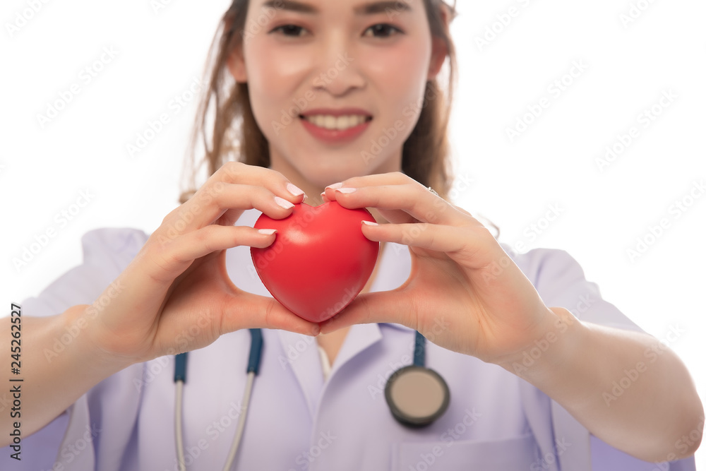 Stethoscope with heart in doctor hands isolated on white background, close-up, free from copy space, healthcare concept. Stethoscope with heart in doctor hands isolated on white background, close-up, free from copy space, healthcare concept.