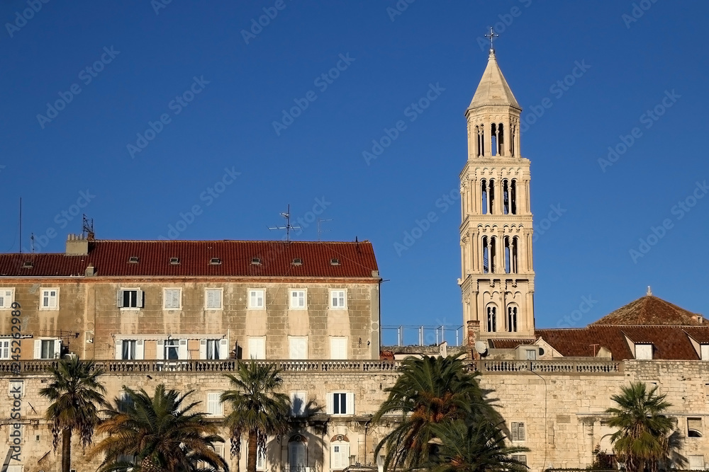Historical buildings on Riva Promenade in Split, Croatia with Saint Domnius bell tower, landmark in Split.