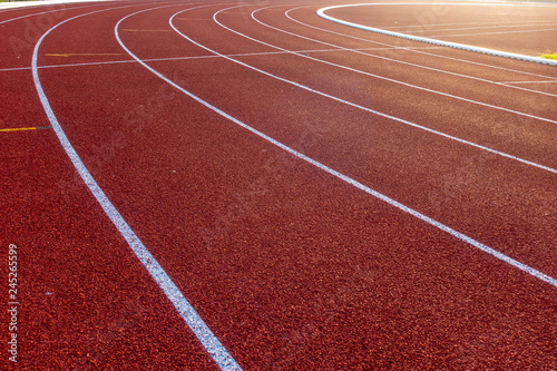 Red running track in stadium